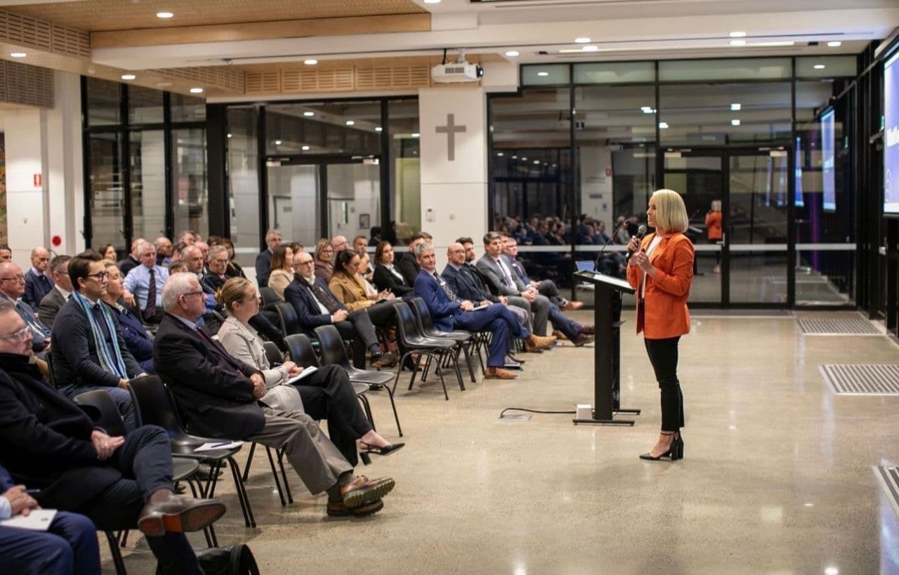 Aimee speaking to a Catholic school leadership audience